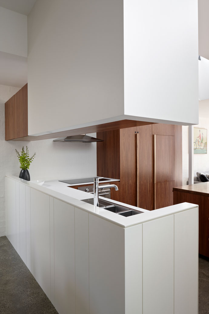 Kitchen joinery materials and colours are drawn from the existing heritage section of the house, referencing the rich heritage timber work and white regency timber lining. 