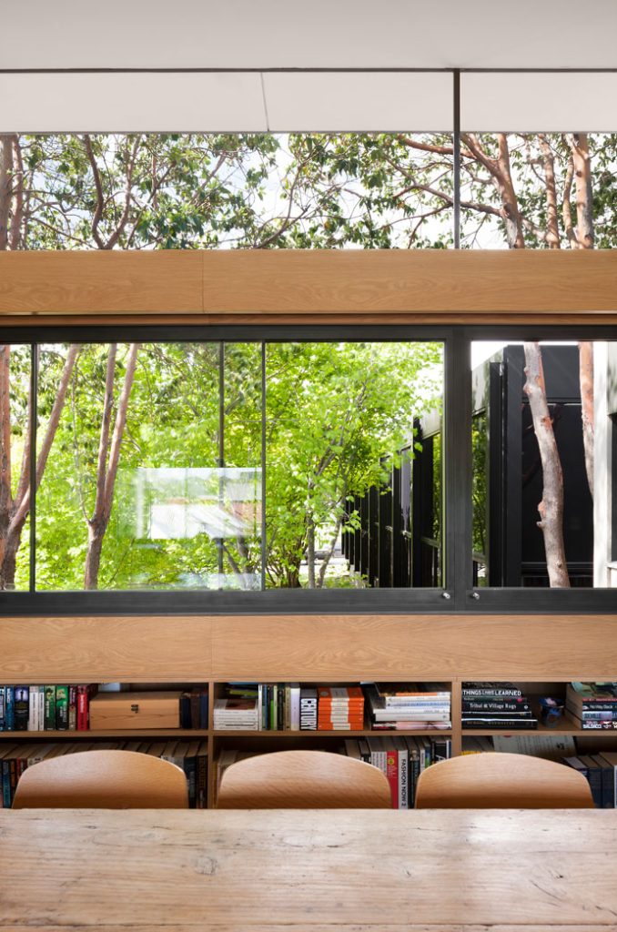 Melbourne Architects. North facing living/dining area looking out to leafy grounds of the library next door. 