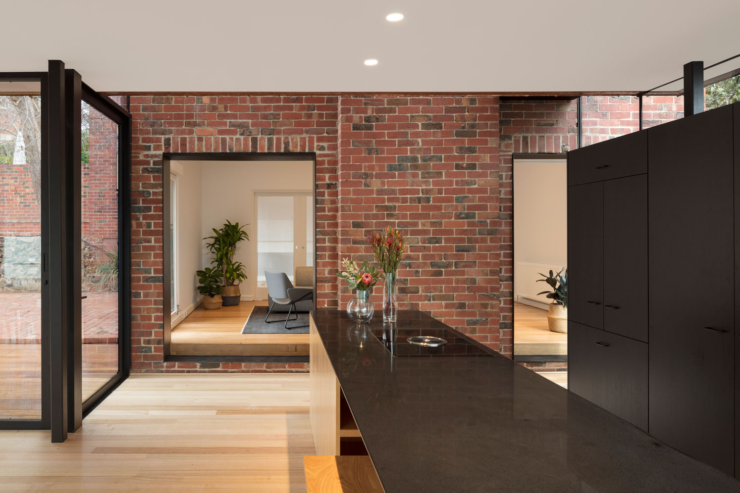 Melbourne architecture. View from new kitchen towards the existing heritage part of the dwelling