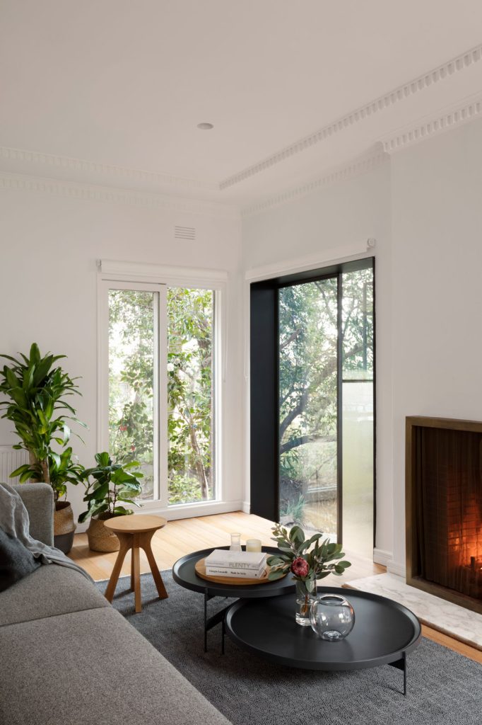 View to heritage living room with contemporary addition