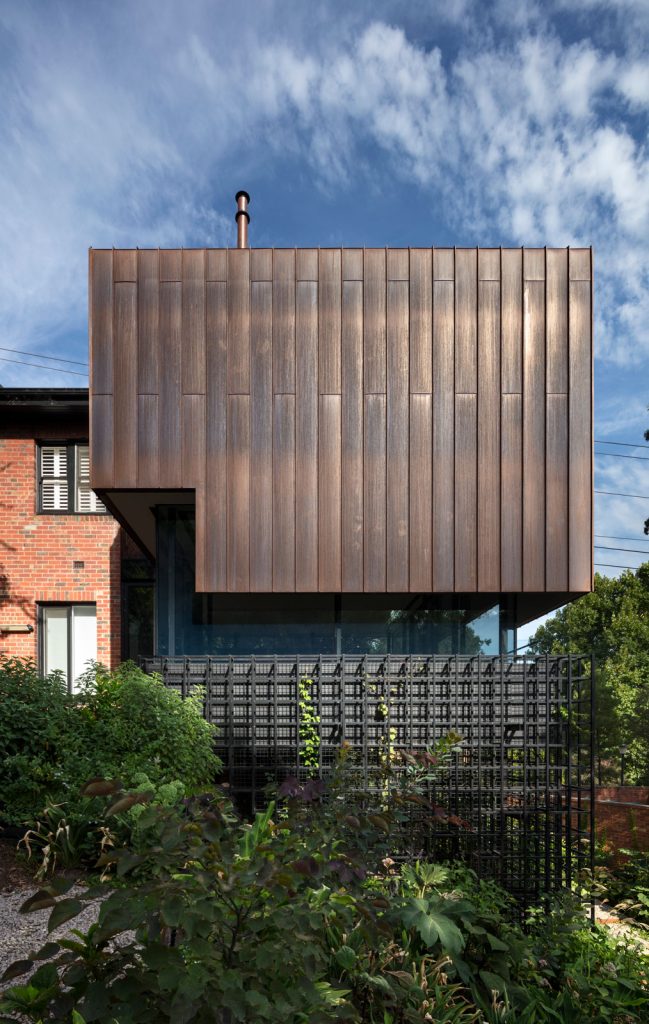 Local architects. Copper cladding with patina responding to the built heritage context